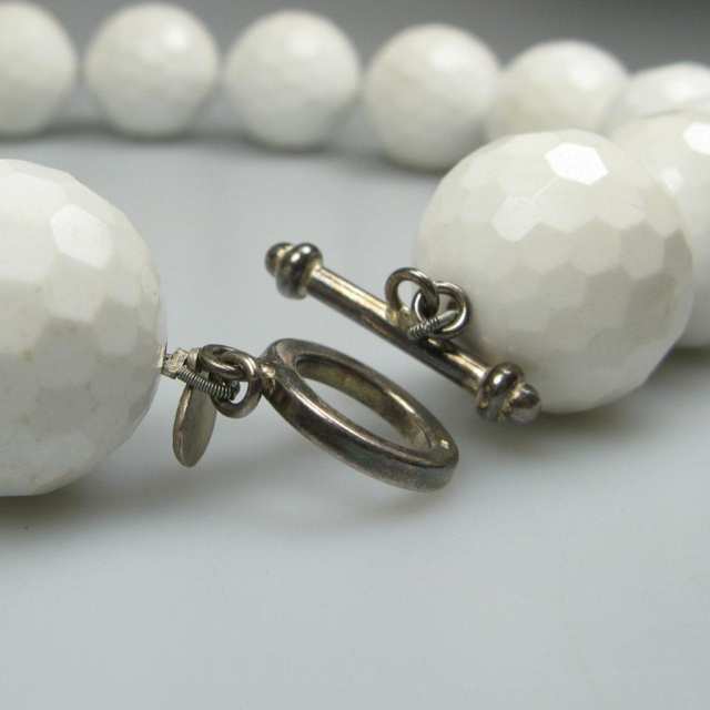 Single Strand Of Faceted White Hardstone Beads