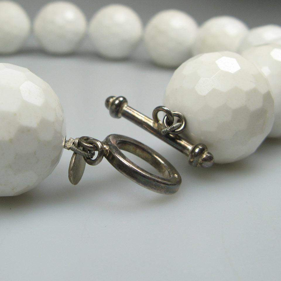Single Strand Of Faceted White Hardstone Beads
