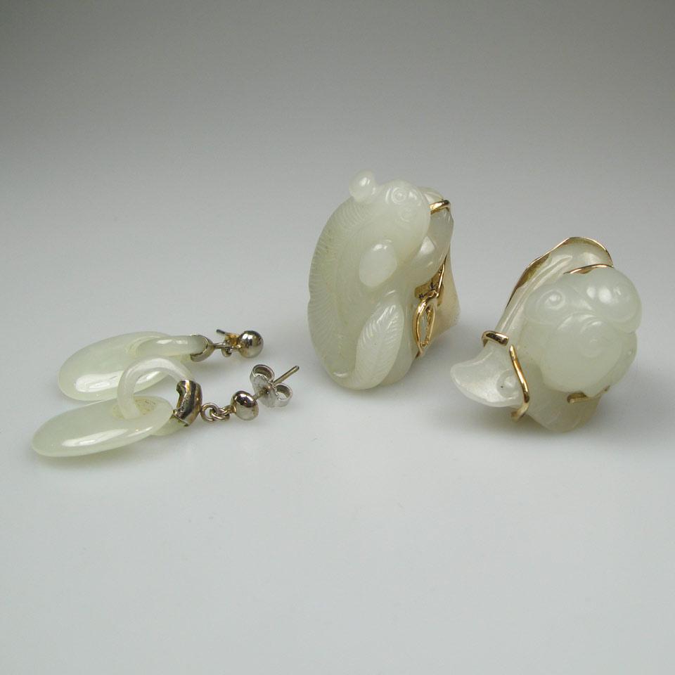 Two Carved Pale Celadon Jade Pebbles