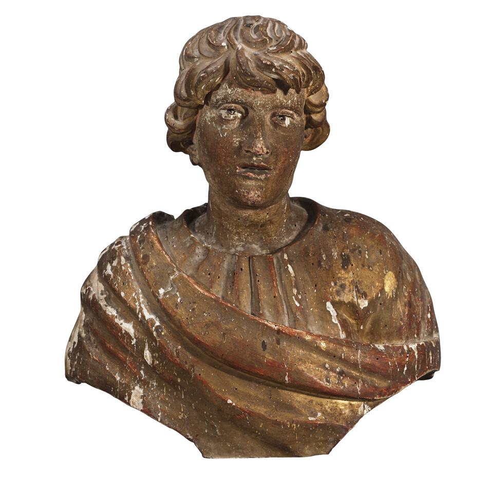 Italian Carved, Polychromed and Parcel Gilt Bust of a Young Male Saint, 19th century