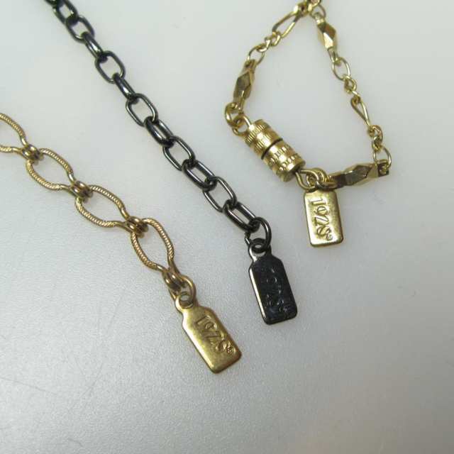 Three 1928 Metal Chains And Pendants