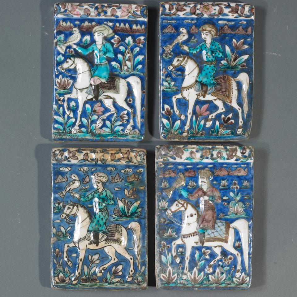 Four Qajar Relief Moulded Pottery Tiles, Persia, 19th century