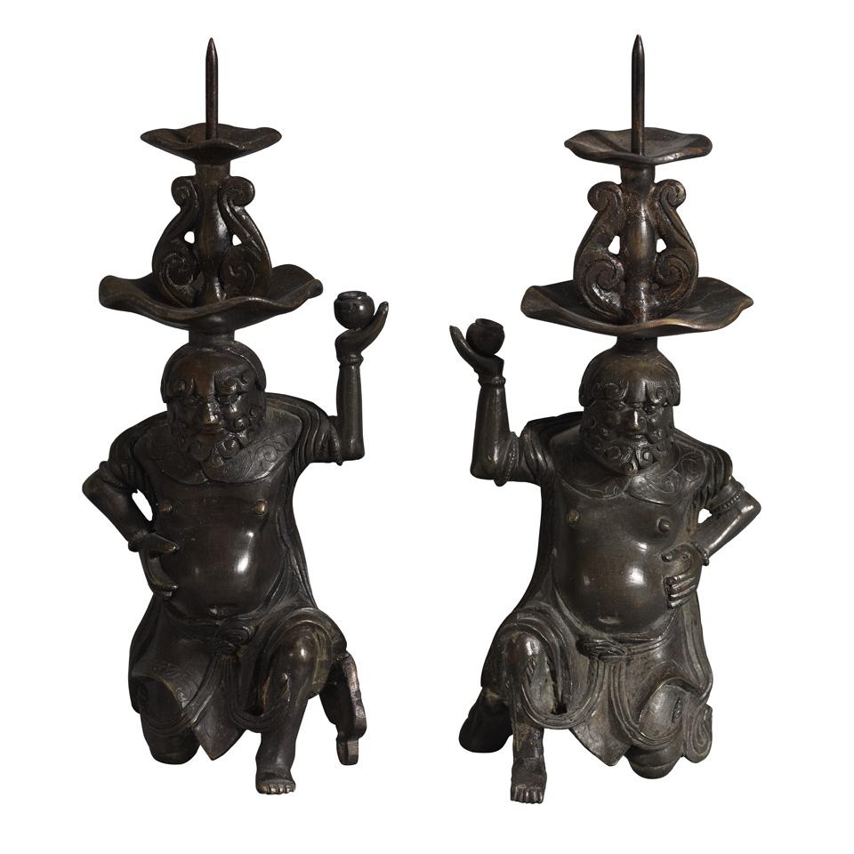 Pair of Bronze ‘Foreigner’ Candle Sticks, 16th/17th Century