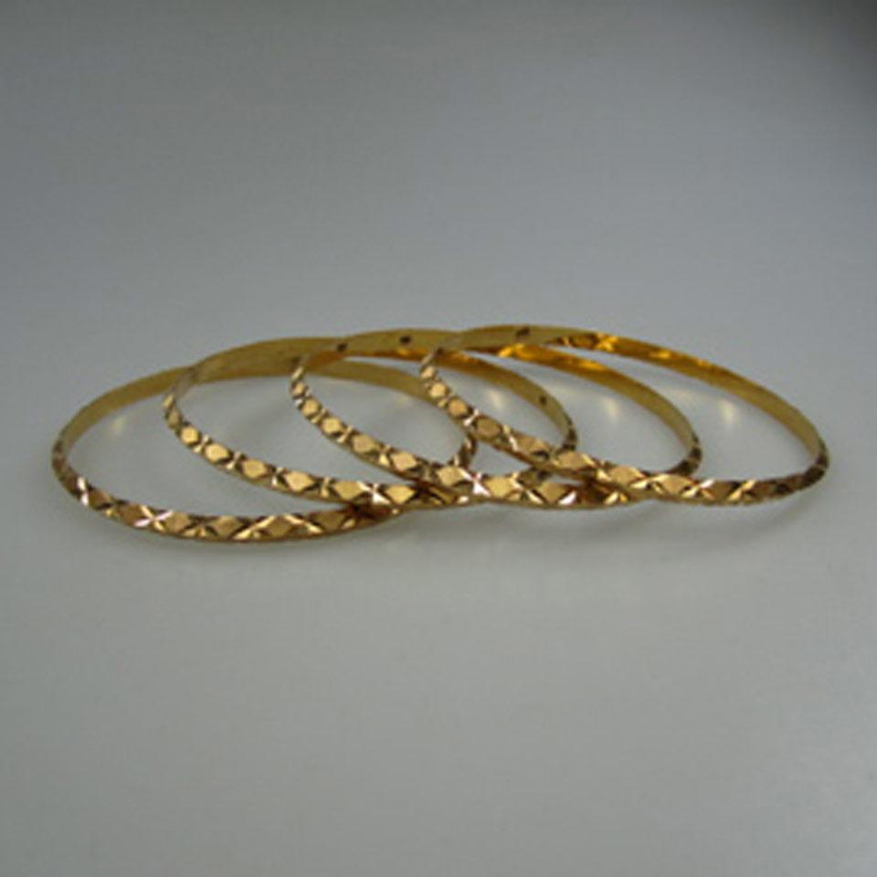  4 x 18k Yellow Gold Faceted Bangles