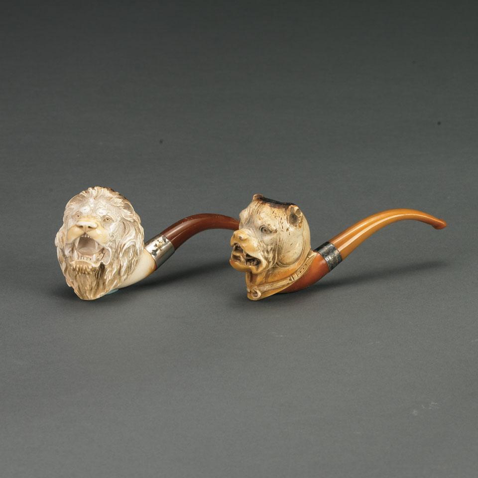 Two Carved Meerschaum Pipes Formed as Lion and Dog Heads, late 19th century