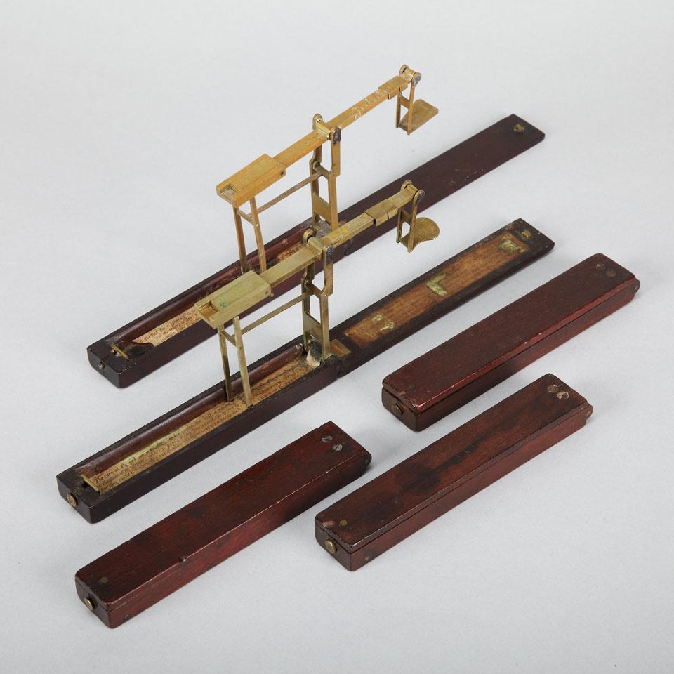 Group of Five Georgian Mahogany and Brass Folding Coin Scales, A. Wilkinson, Ormskirk, 18th century