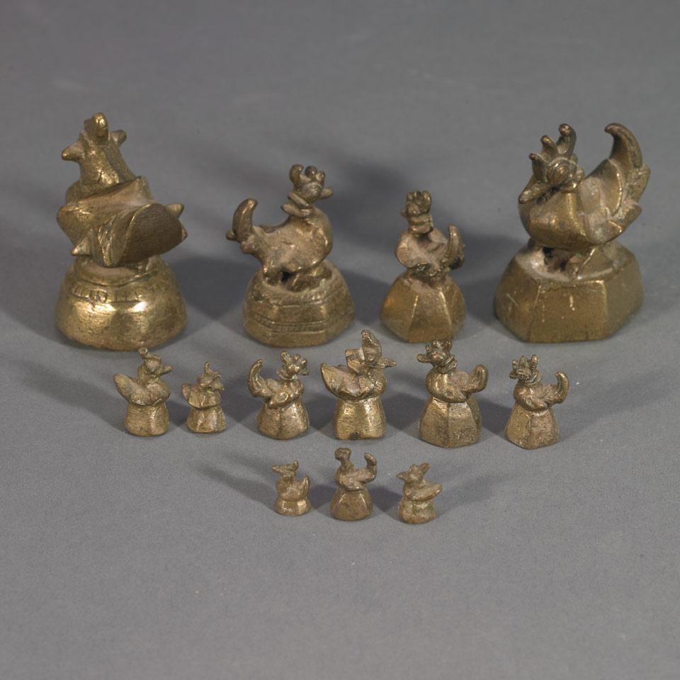 Graduated Set of Thirteen Burmese Bronze Bird Form Opium Weights, early 20th century