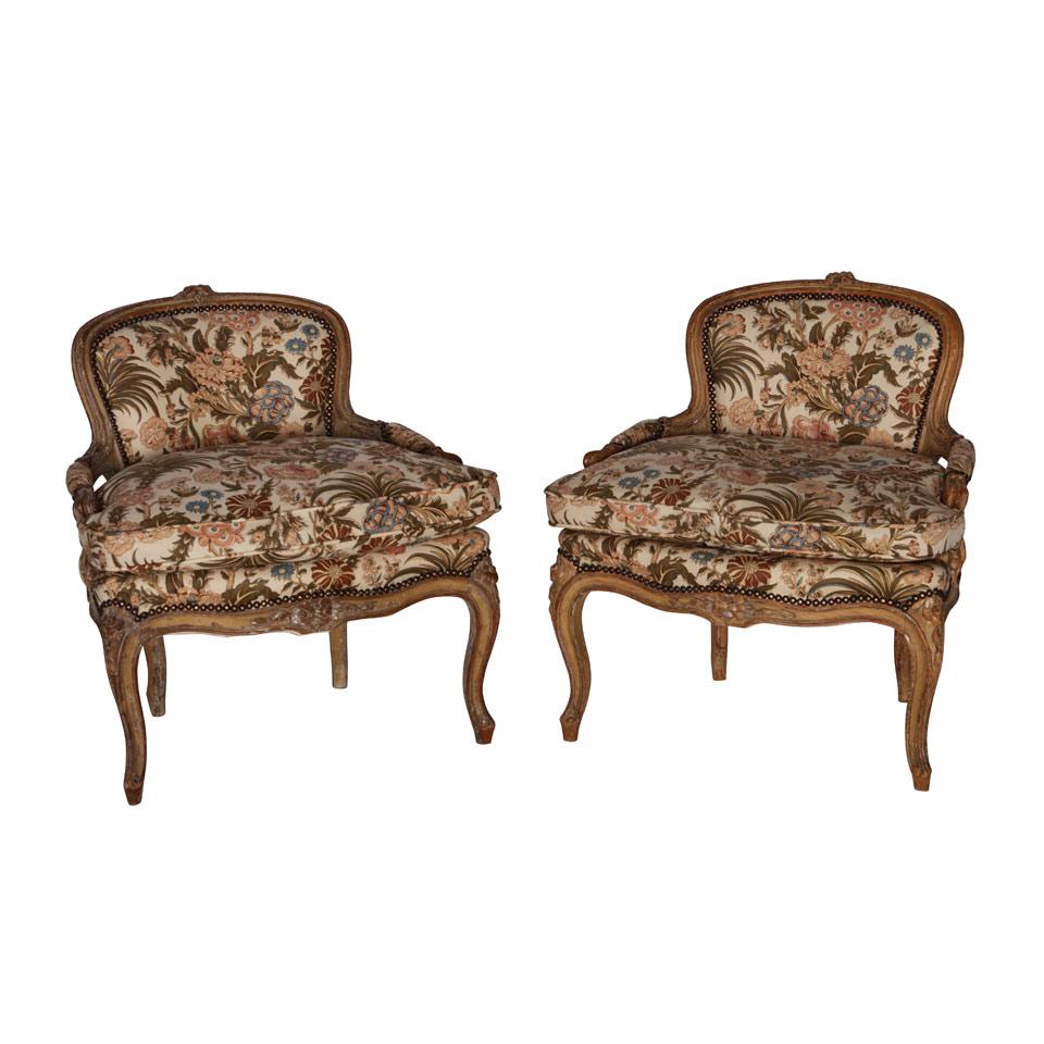 Pair of Early Quebec Louis XV Style Parcel Gilt Low Fauteiuls