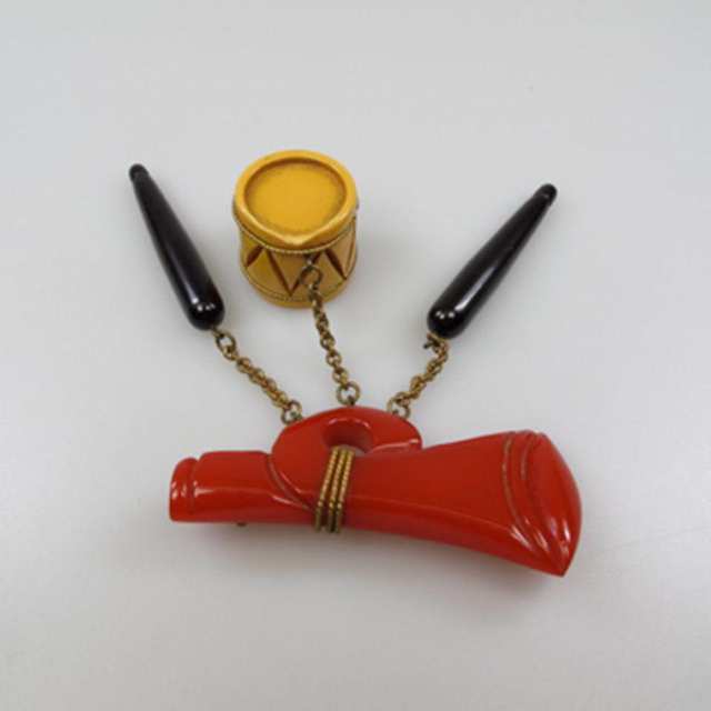 Red, Black And Butterscotch Bakelite Musical Instrument Brooch