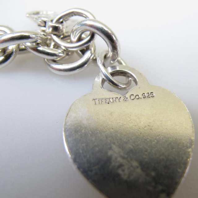 Tiffany & Co. Sterling Silver Circular Link Bracelet with a sterling silver heart tag pendant
