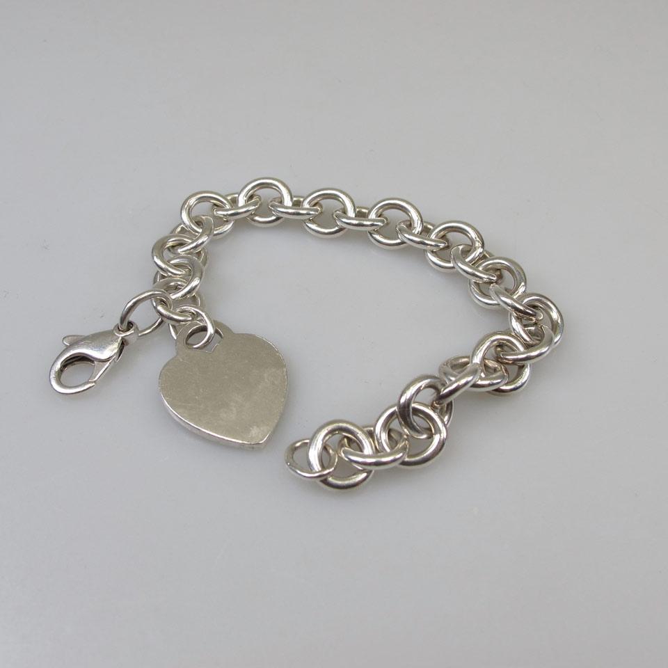 Tiffany & Co. Sterling Silver Circular Link Bracelet with a sterling silver heart tag pendant