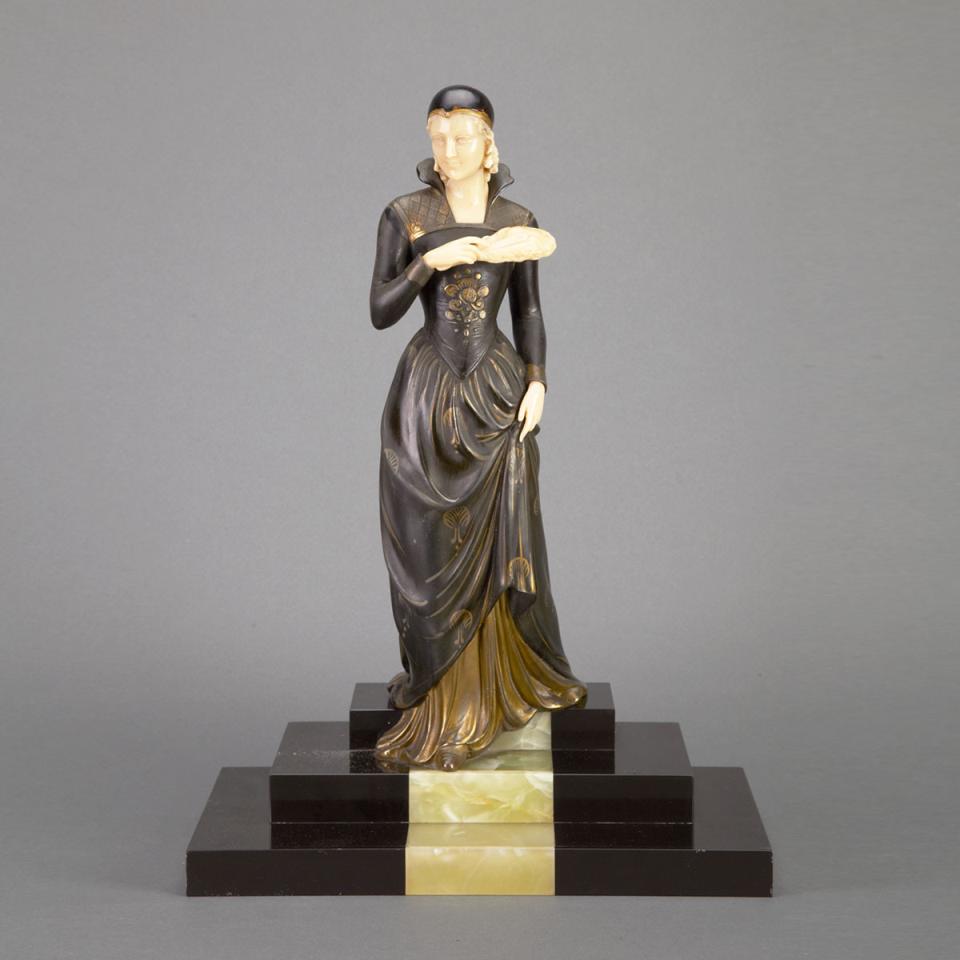 French Art Deco Parcel Gilt and Patinated Metal and Ivory Figure of a Young Woman, c.1925