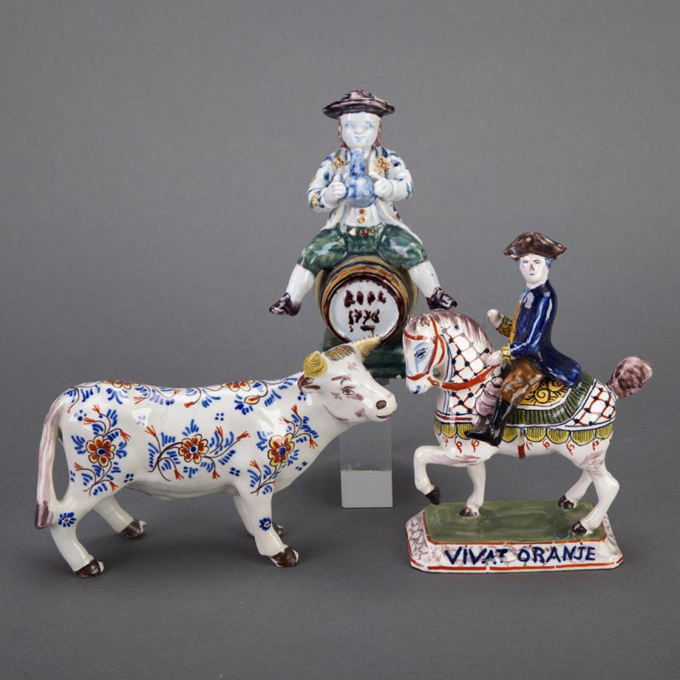Delft Polychrome Figure on Horseback, Model of a Bull and a Figure Seated on a Barrel, 19th century
