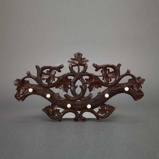 Group of Three Black Forest Carved Pipe Racks, 19th century
