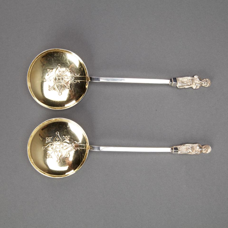 Pair of Silver Apostle-Topped Berry Spoons, late 19th century