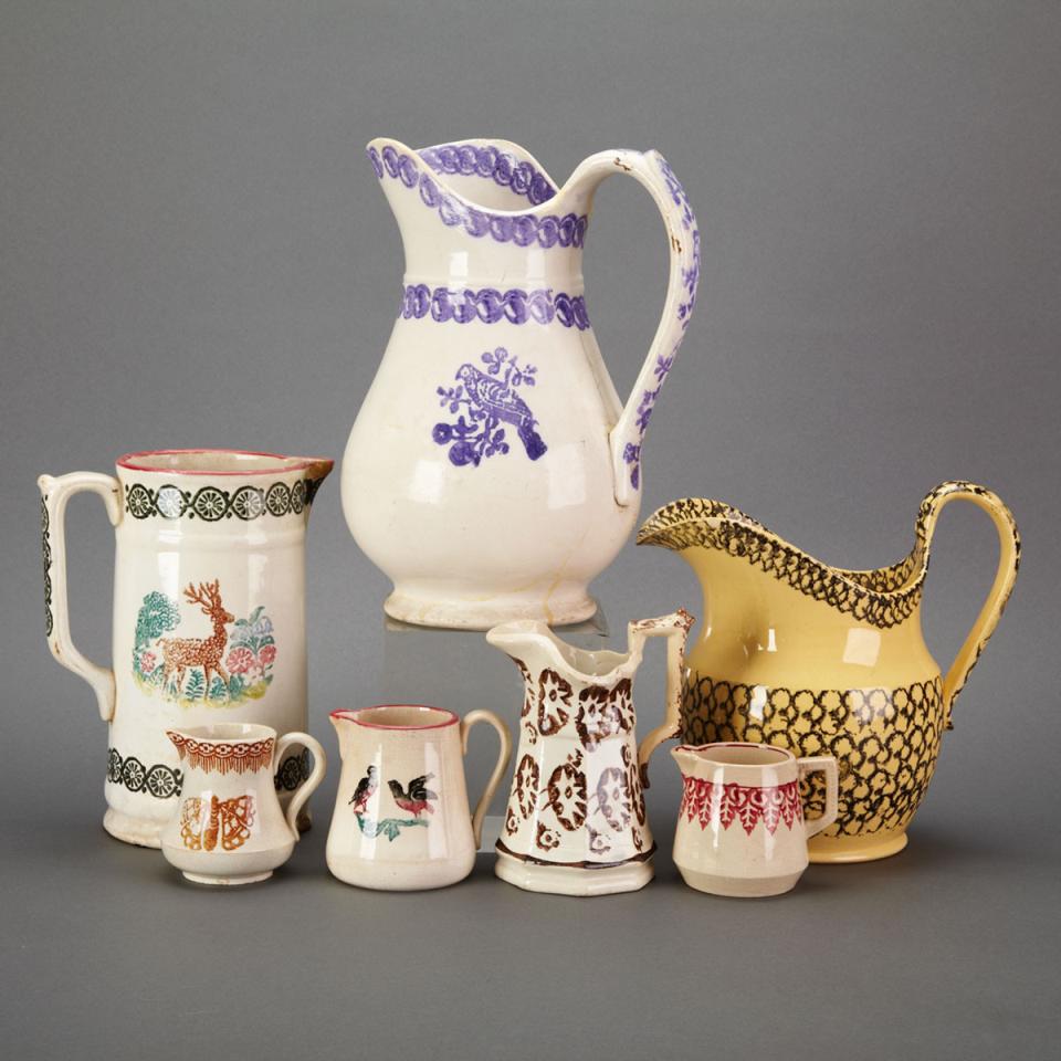 Group of Seven Port Neuf Pottery Jugs and Creamers, 19th century