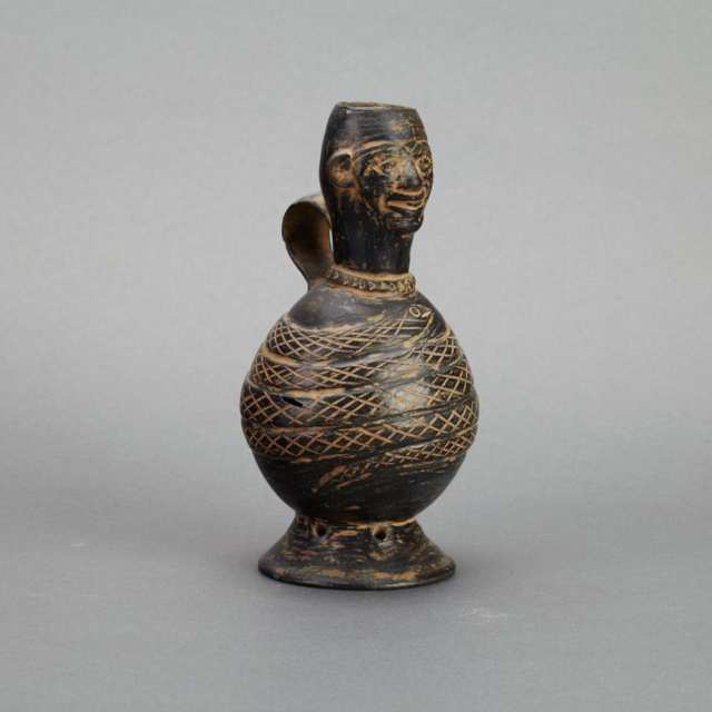 Group of Four Pre-Columbian Moche Black Pottery Figural Vessels, Peru