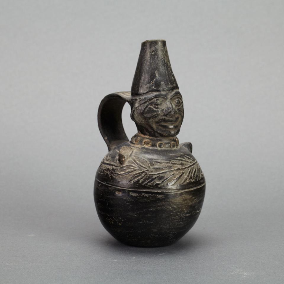 Group of Four Pre-Columbian Moche Black Pottery Figural Vessels, Peru