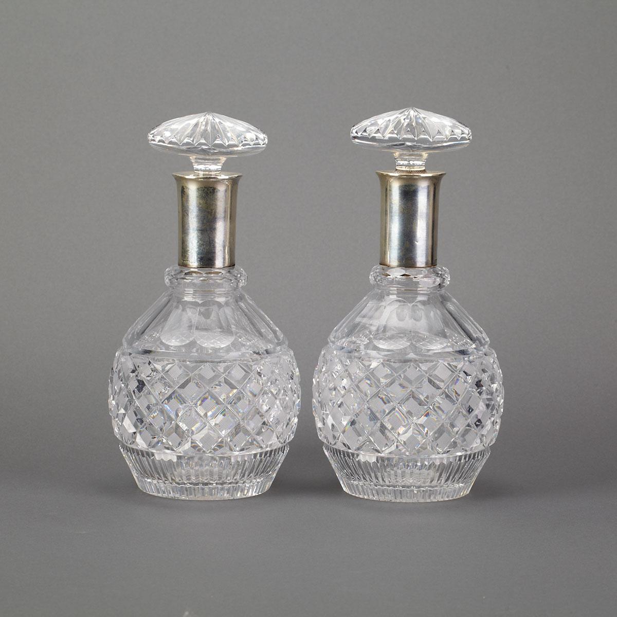 Pair of Silver Mounted Cut Glass Decanters with Stoppers, early 20th century
