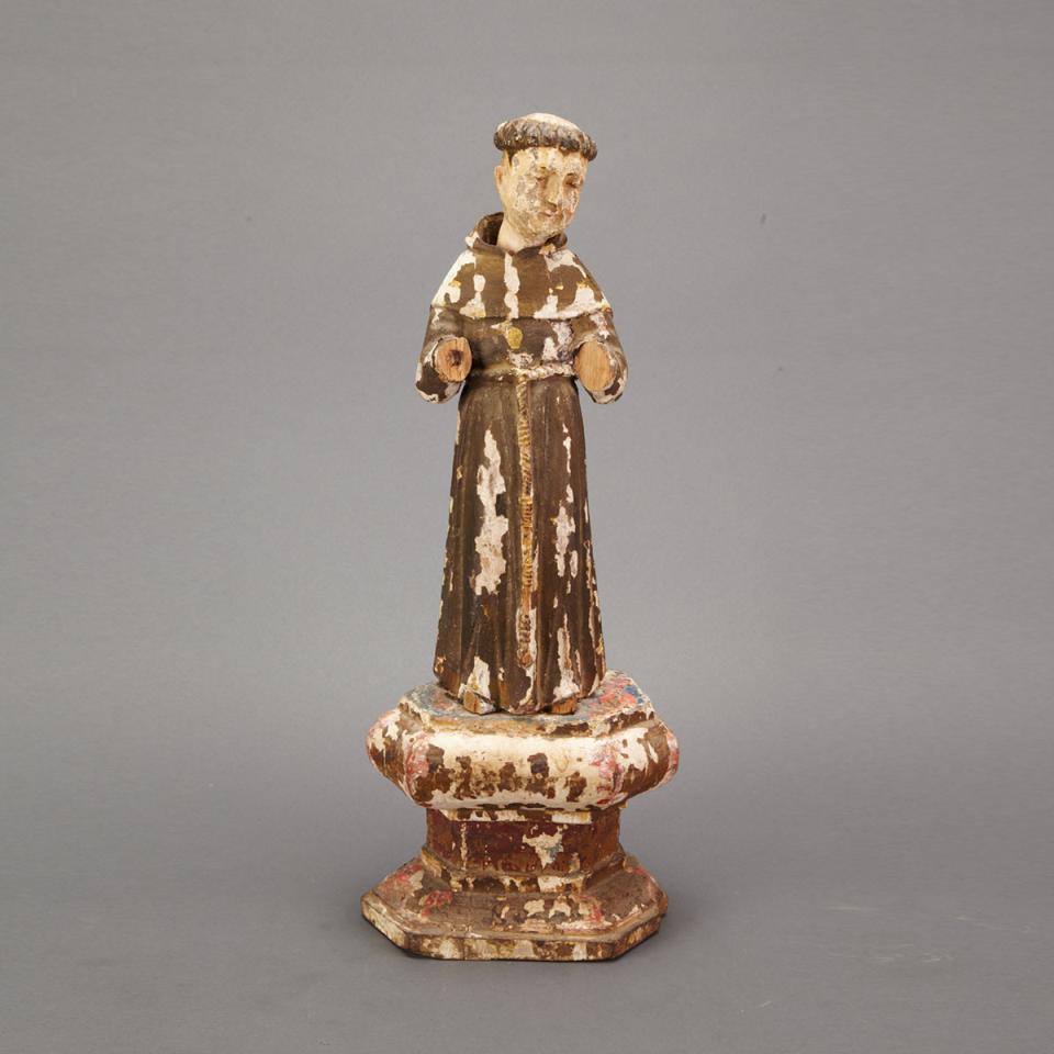 Spanish Filipino Carved and Polychromed Figure of a Monk-Saint, 19th century 