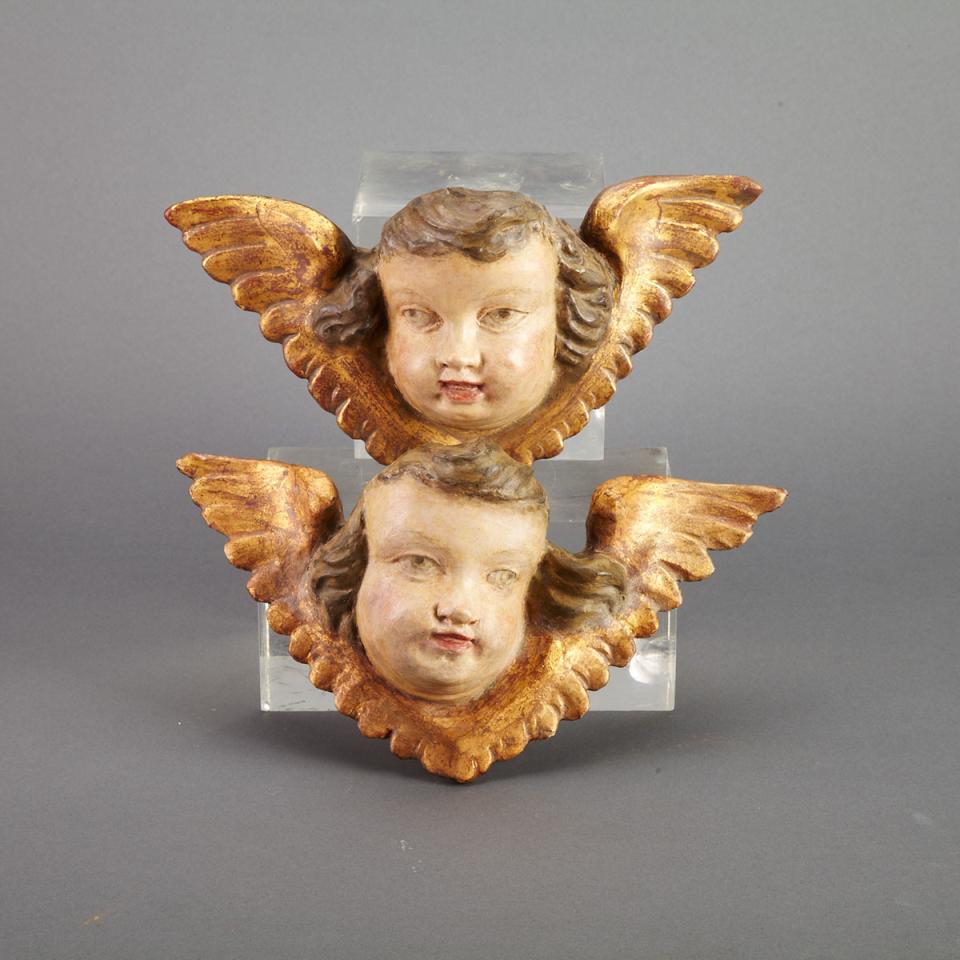 Pair Italian of Carved, Polychromed and Parcel Gilt Cherub Head Brackets, mid 20th century