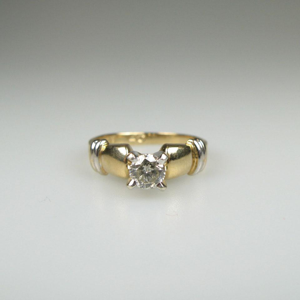 14k Yellow And White Gold Solitaire Ring set with a brilliant cut diamond (approx. 0.40ct.)