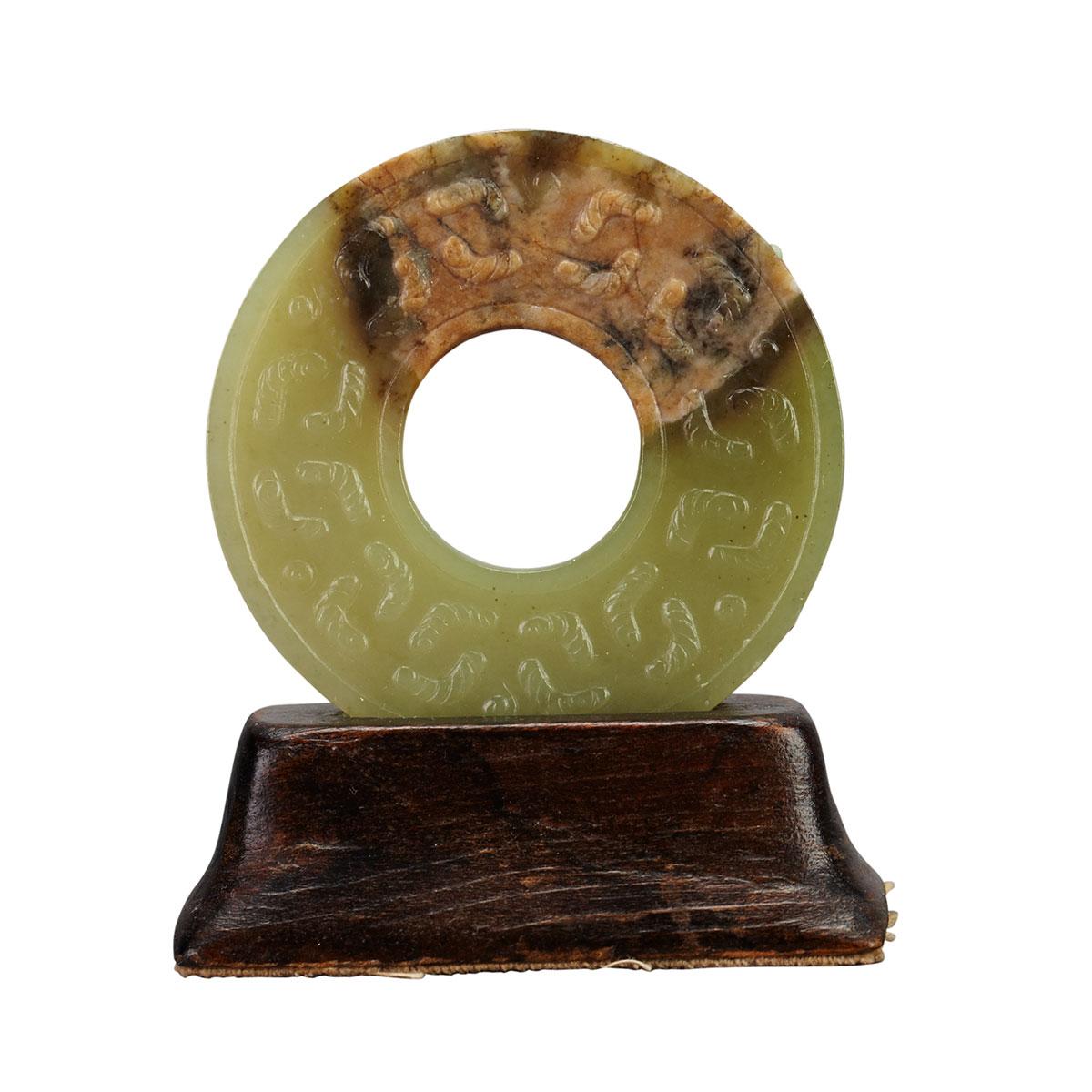 Mottled Celadon Jade ‘Silkworm’ Bi, Ming Dynasty
