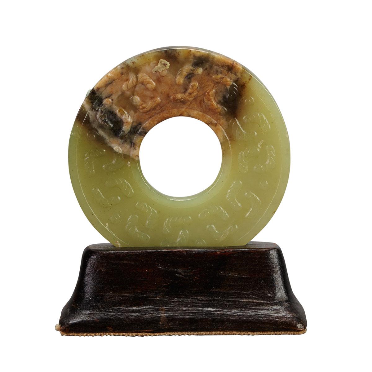 Mottled Celadon Jade ‘Silkworm’ Bi, Ming Dynasty