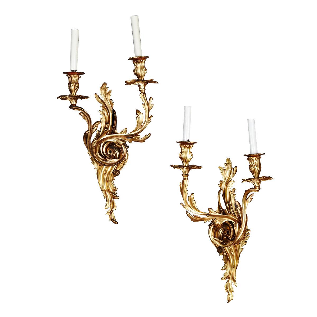 Pair of Louis XV Style Gilt Bronze Two Light Wall Sconces, early 20th century