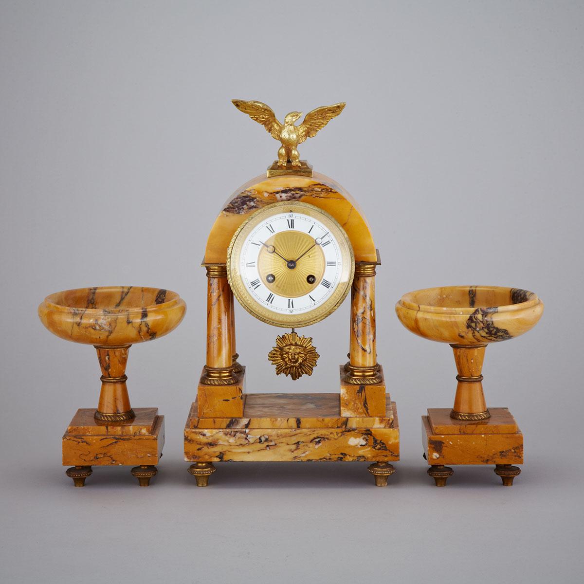 French Three Piece Ormolu Mounted Sienna Marble Clock Garniture, early 20th century