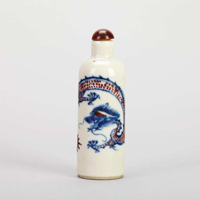 Four Blue, White and Copper Red Rouleau Snuff Bottles, 19th Century