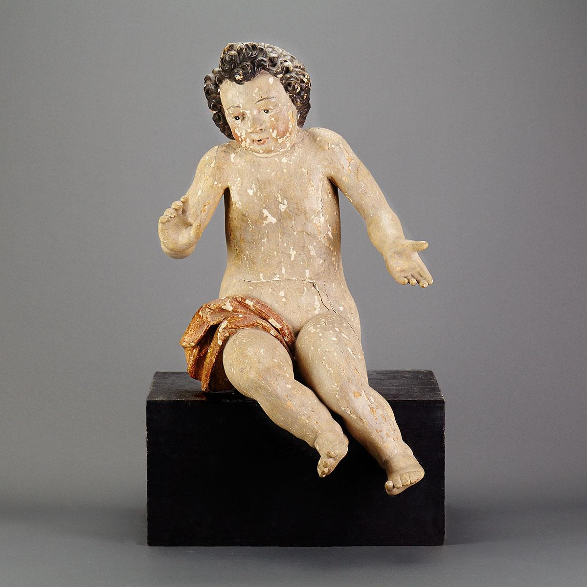 Italian Carved and Polychromed Figure of a Cherub, early 19h century