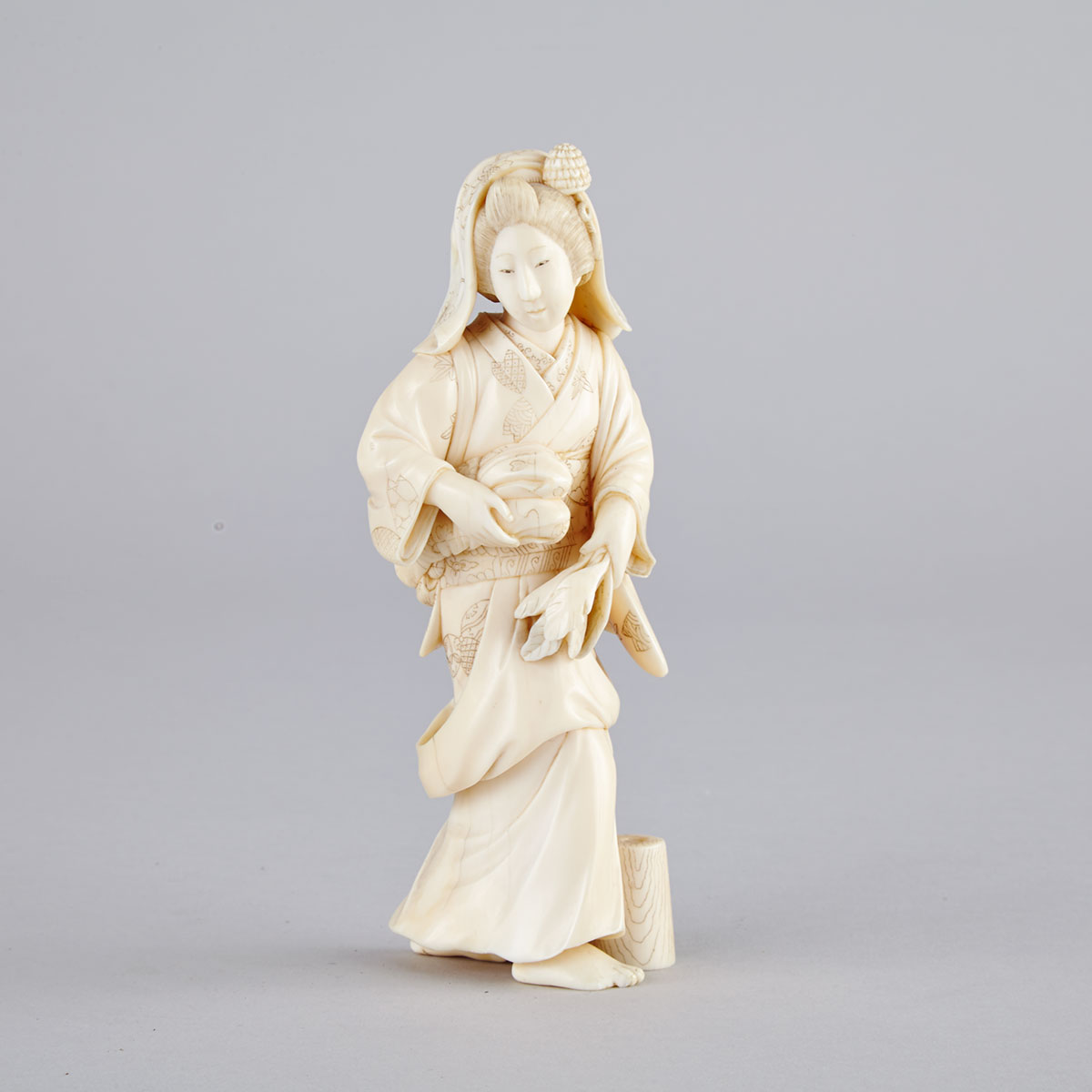 Ivory Carved Okimono of a Lady, Meiji Period, 19th Century