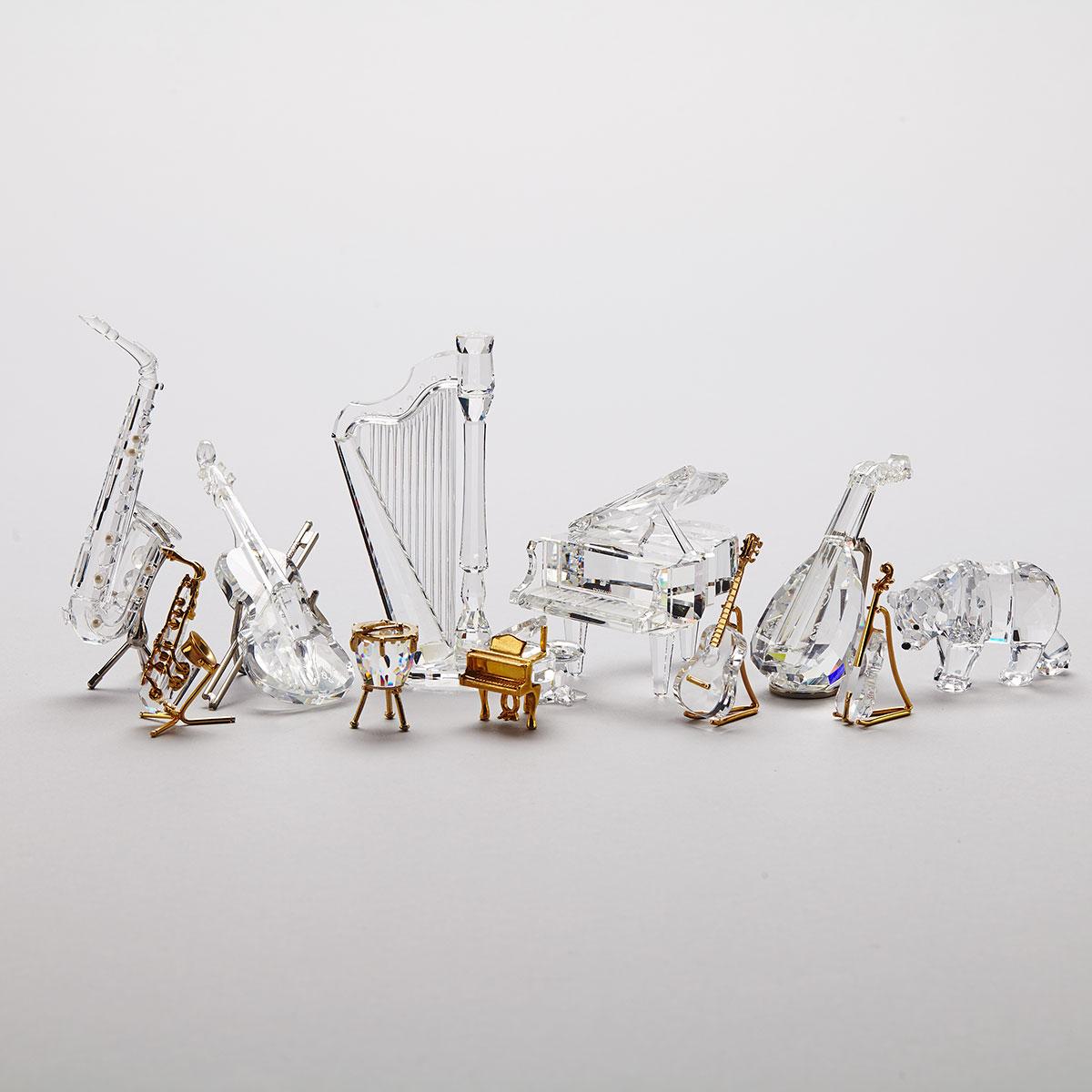 Ten Swarovski Crystal Musical Pieces and One Bear, late 20th/early 21st century