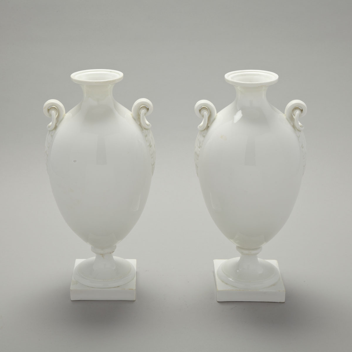 Pair of Copeland White Glazed Two-Handled Vases, c.1851-85