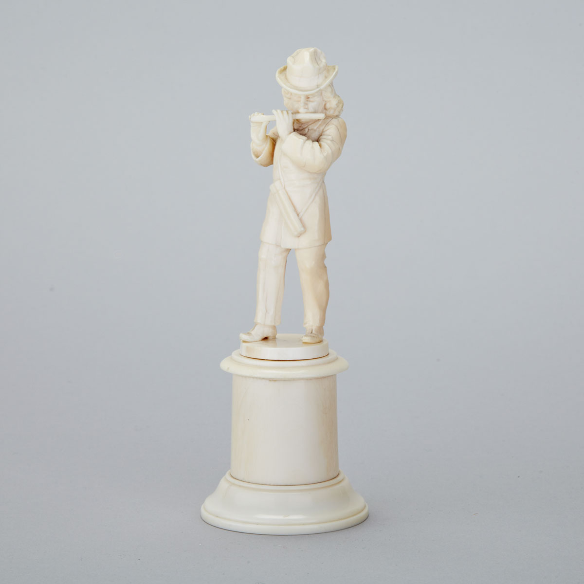 Dieppe Carved Ivory Miniature Figure of a Musician, 19th century