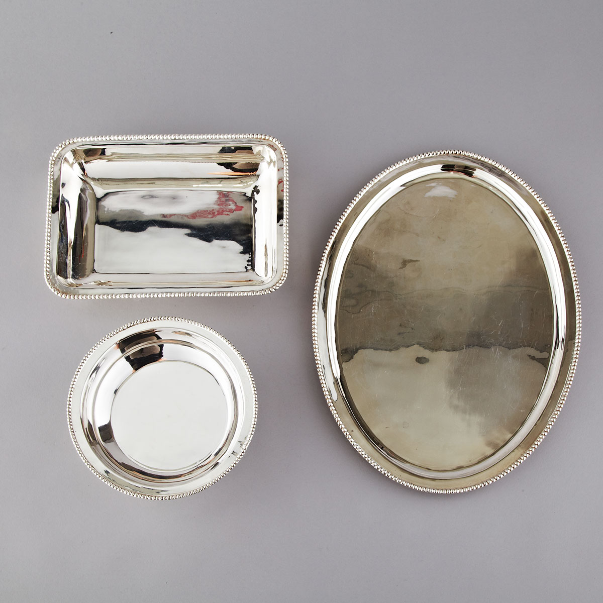 Indian Silver Oval Tray and Two Serving Dishes, 20th century