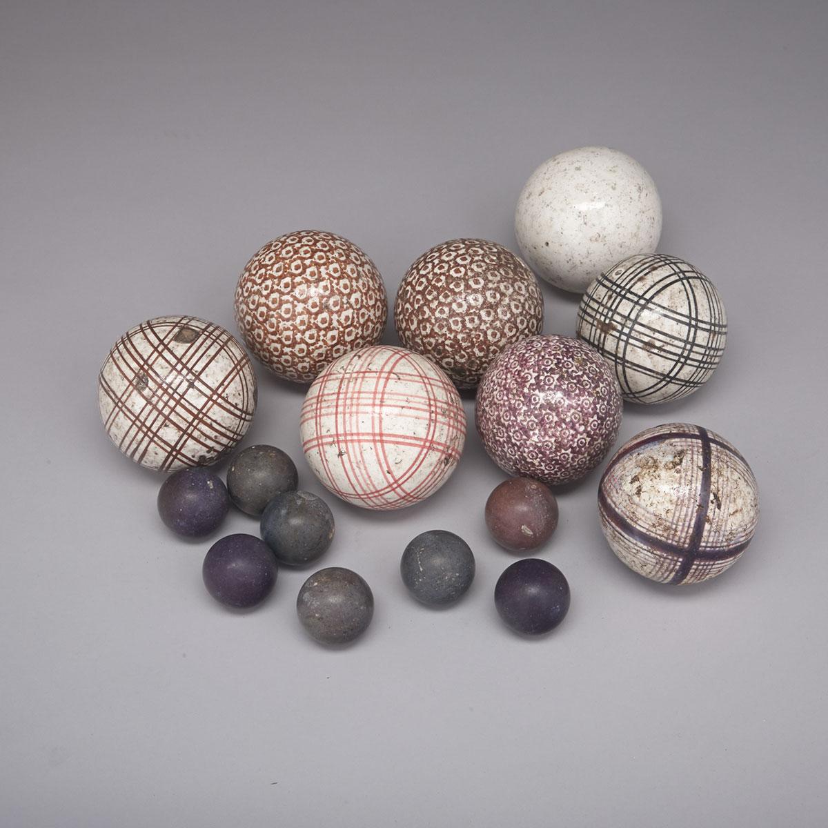 Eight Pottery Carpet Balls, late 19th century