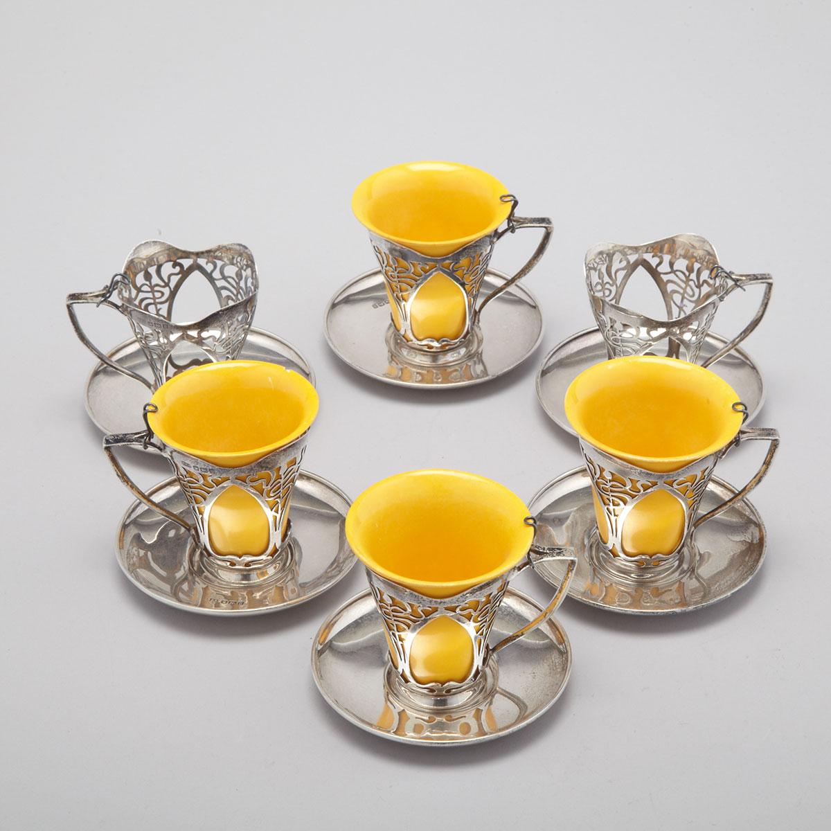 Six English Silver Mounted Royal Doulton Yellow Glazed Coffee Cups and Saucers, Roberts & Belk, Sheffield, 1912