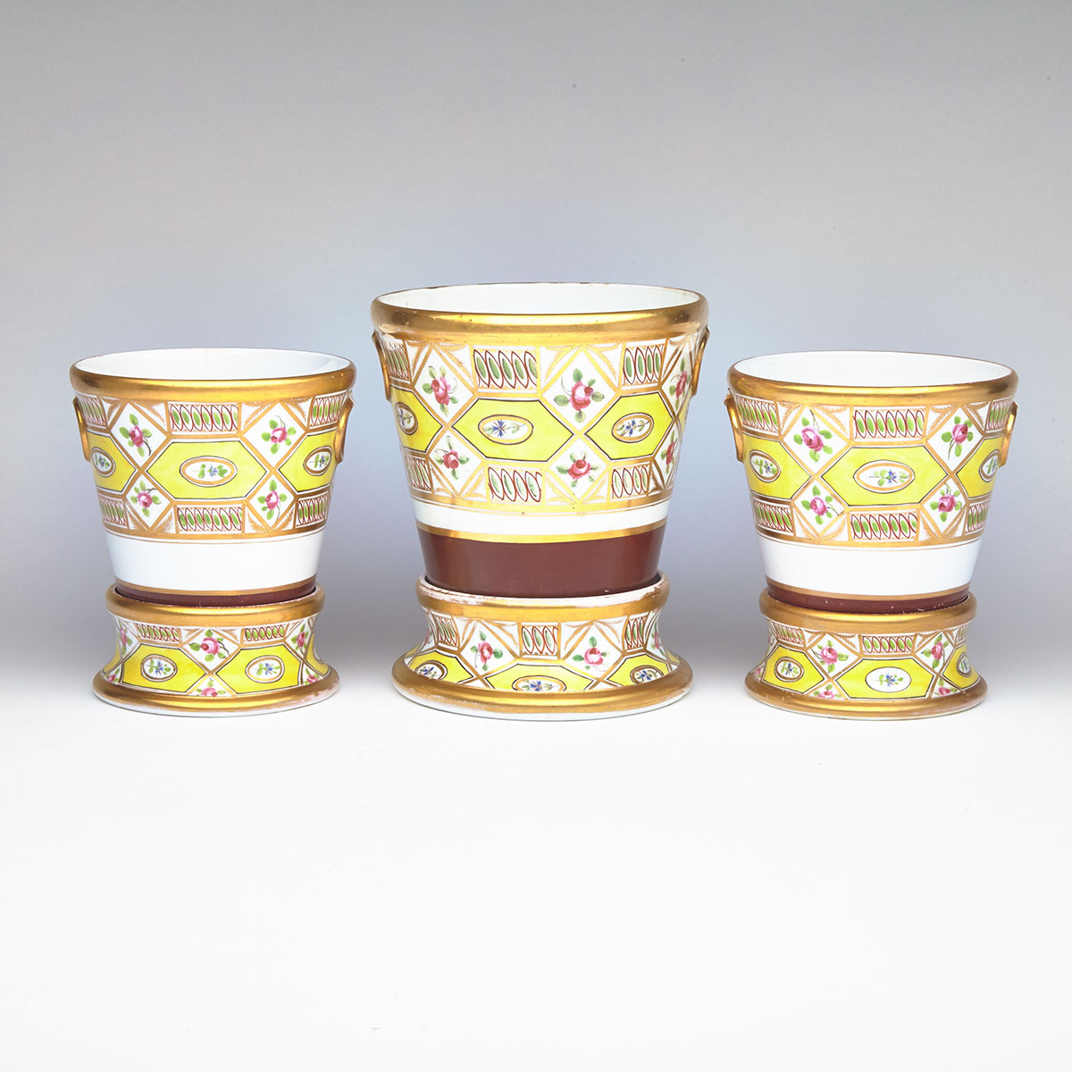 Garniture of Three Spode ‘Church Gresley’ Cachepots and Stands, c.1820