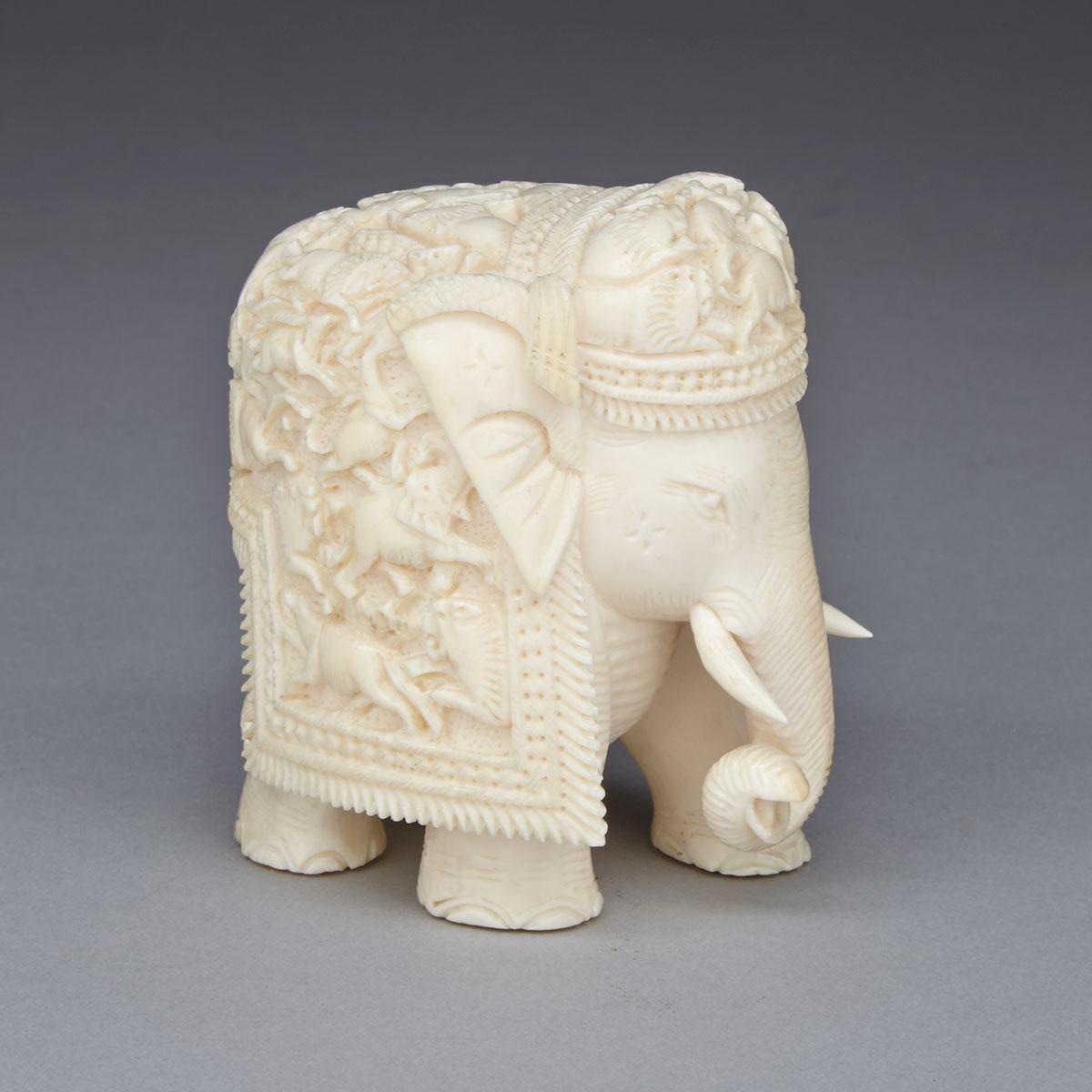 East Indian Carved Ivory Model of an Elephant, early 20th century