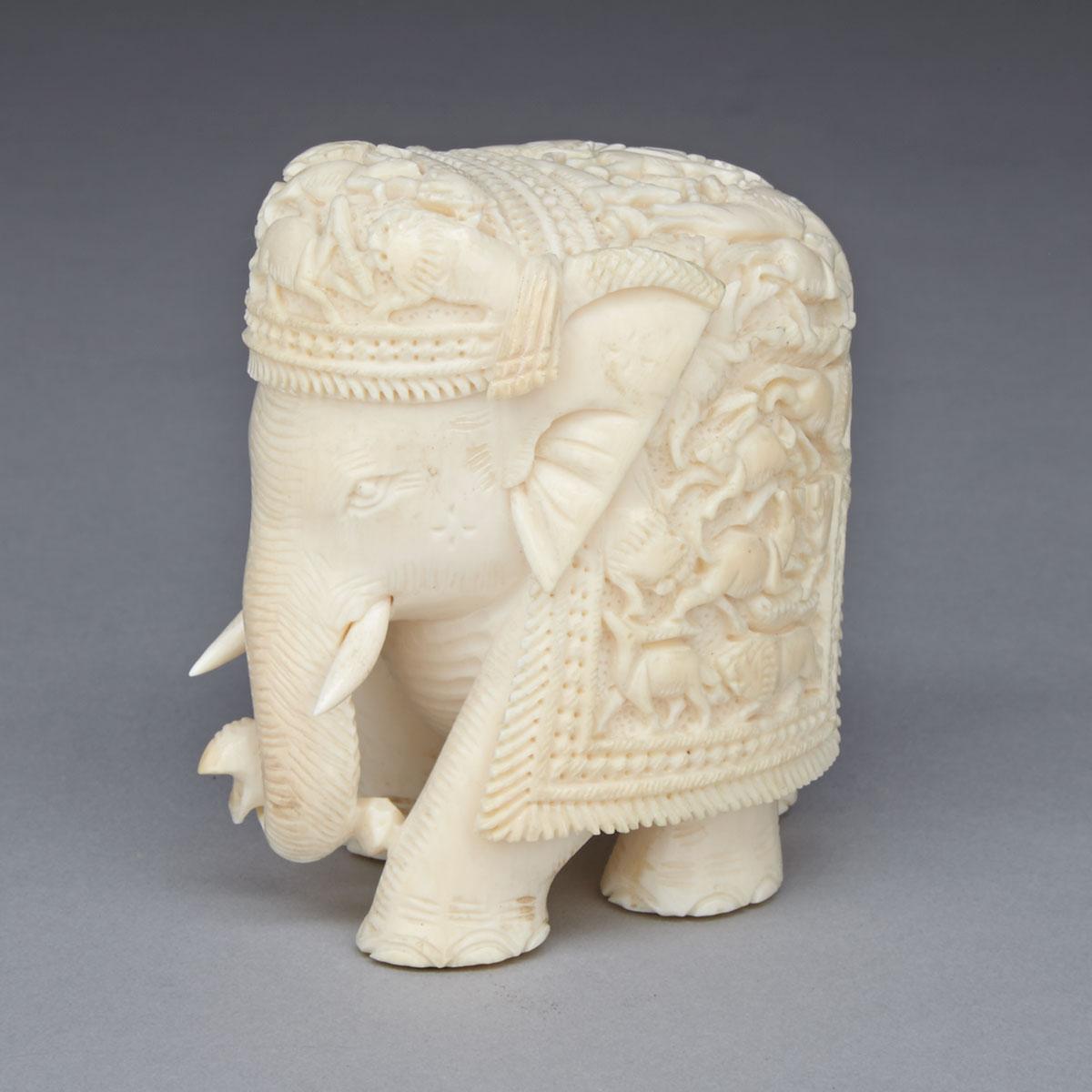 East Indian Carved Ivory Model of an Elephant, early 20th century