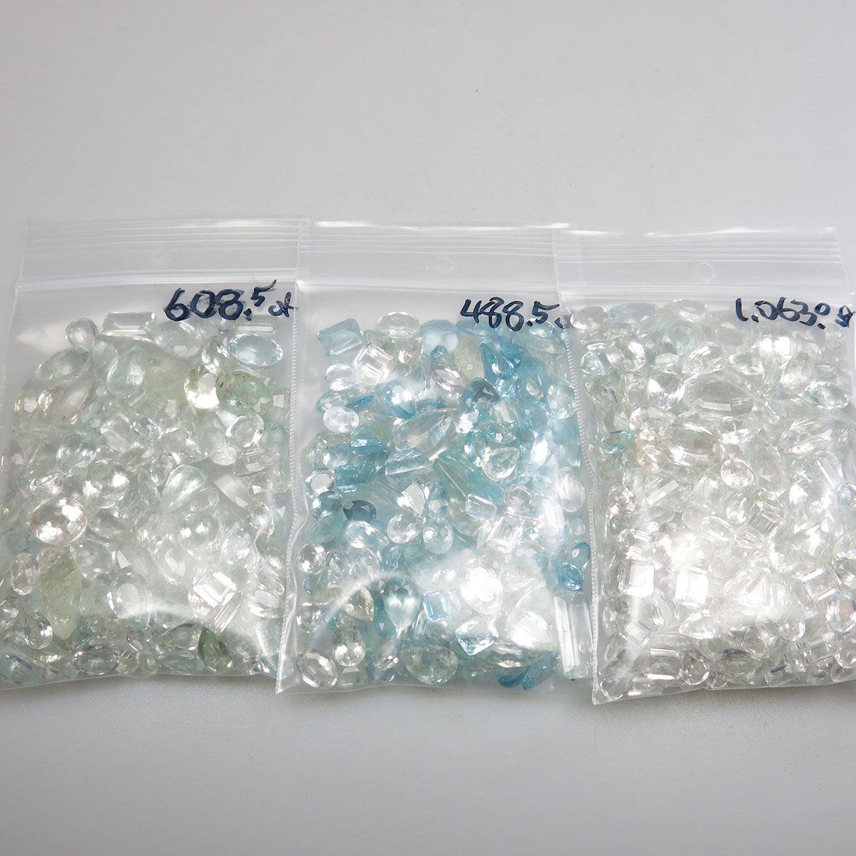 Large Quantity Of Unmounted Clear And Pale Blue Topaz, Beryl And Rock Crystal