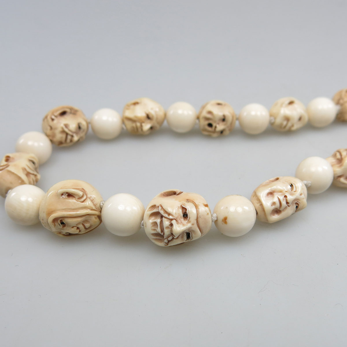 Single Graduated Strand Of Ivory Beads