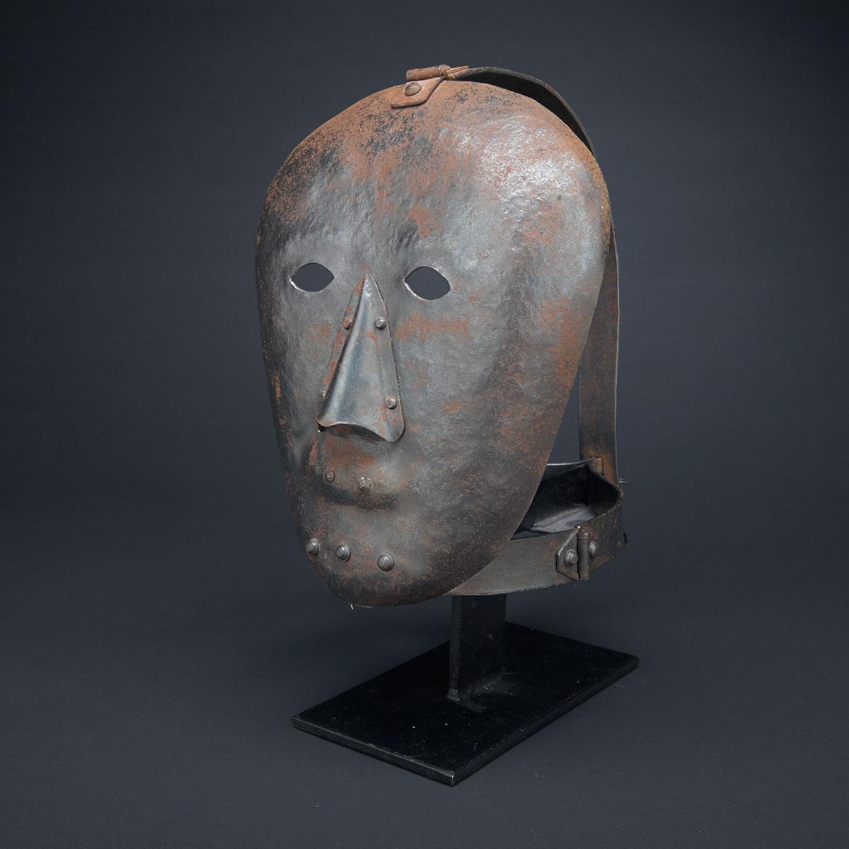 Mediaeval German Style Wrought Iron ‘Shame’ Mask, 20th century