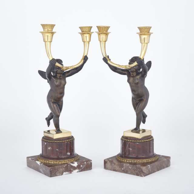 Pair of French Empire Style Gilt and Patinated Bronze Figural Candelabra, 19th/early 20th century