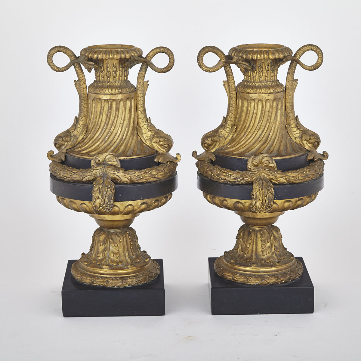 Pair of Large Louis XVI Style Ormolu Mounted Patinated Bronze Urns, 19th century