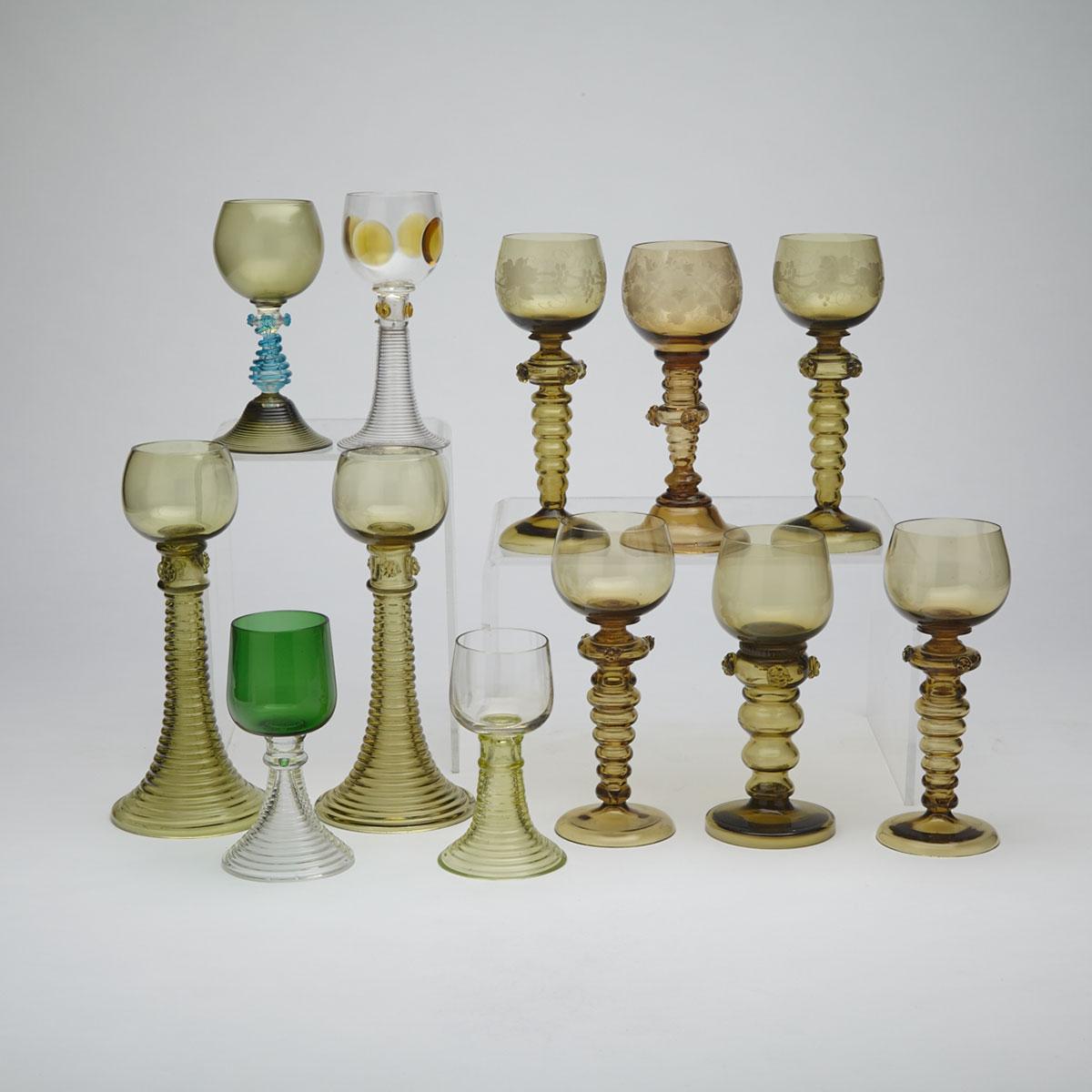 Twelve Various German Mainly Green Glass Roemers, 19th/20th century