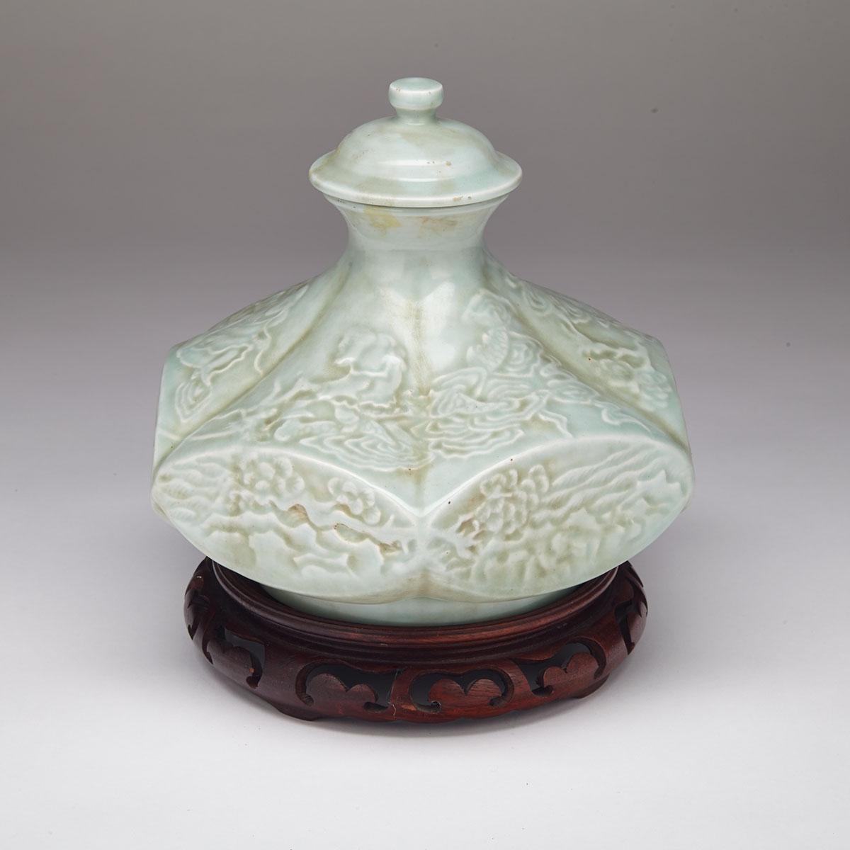 Moulded Celadon ‘Lohan’ Jar and Cover