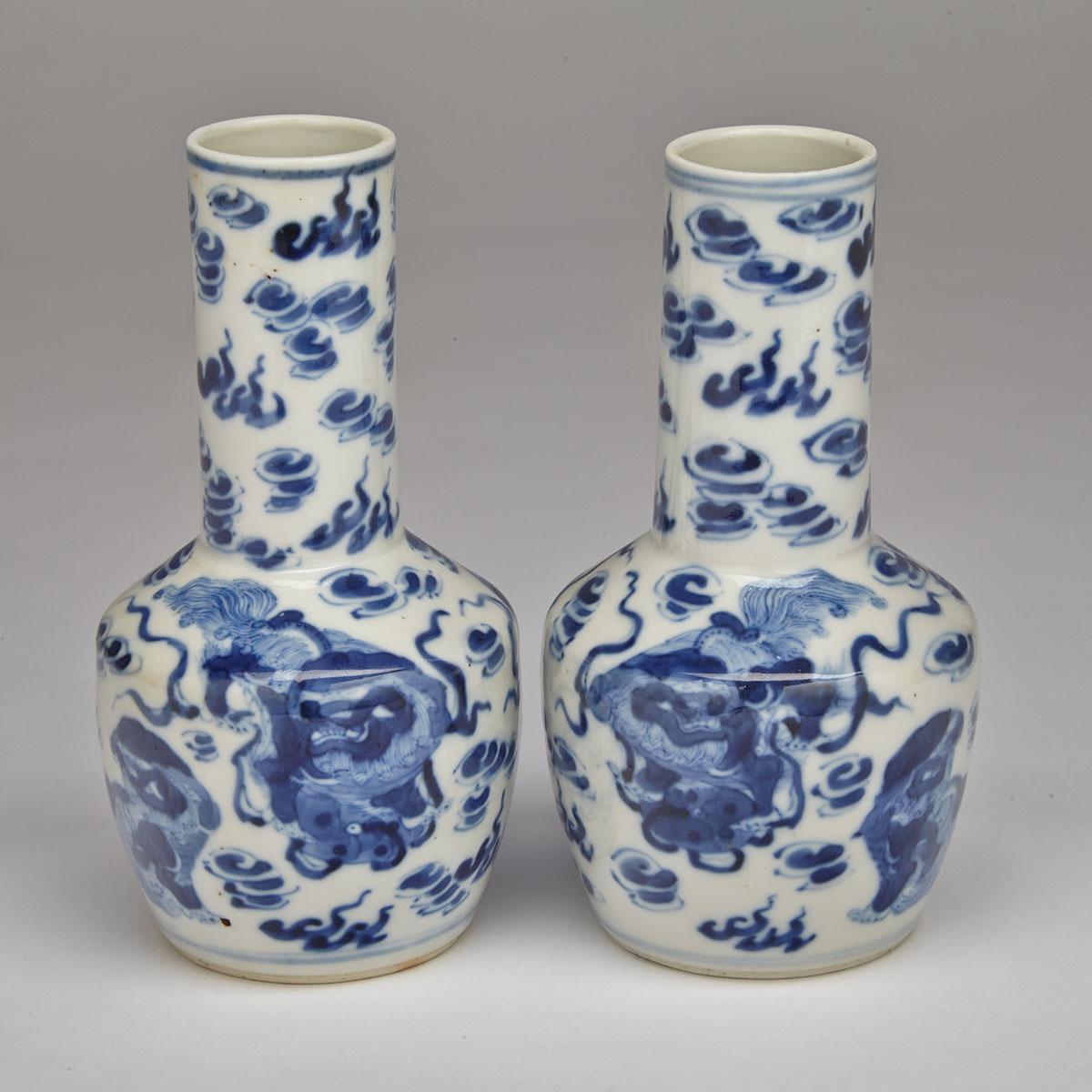 Pair of Small Blue and White ‘Fu-Lion’ Bottle Vases, Kangxi Mark, 19th Century